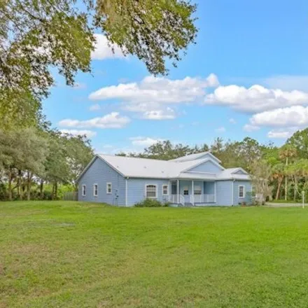 Buy this 4 bed house on 7898 Windover Way in Titusville, Florida