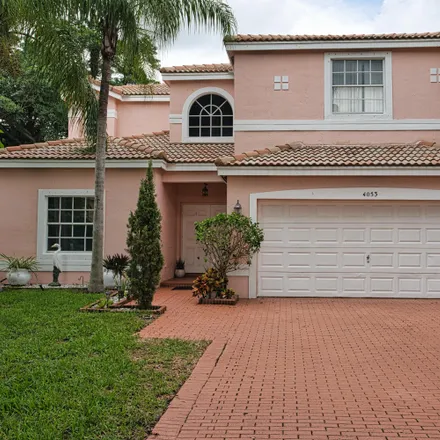 Buy this 4 bed house on 4053 Northwest 63rd Street in Coconut Creek, FL 33073