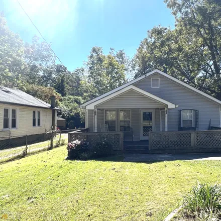 Buy this 2 bed house on 1552 West Poplar Street in Griffin, GA 30224