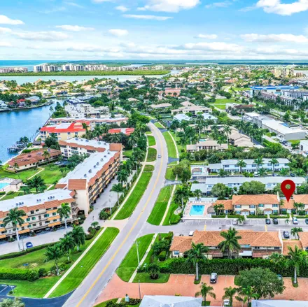 Buy this 2 bed condo on 747 West Elkcam Circle in Marco Island, FL 34145