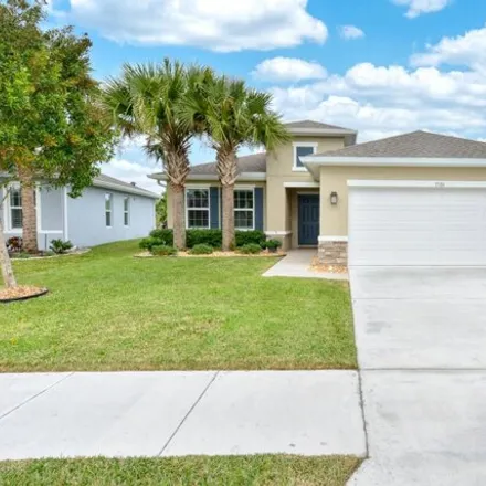 Buy this 3 bed house on 3526 Carriage Pointe Cir in Fort Pierce, Florida