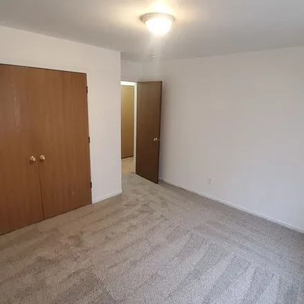 Rent this 4 bed apartment on 885 Regent Drive in DeKalb, IL 60115