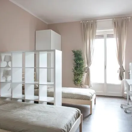 Rent this 4 bed room on Piazzale Carlo Magno in 1, 20149 Milan MI