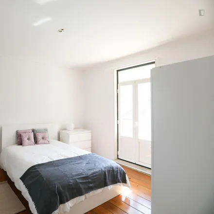 Rent this 5 bed room on Rua Cidade da Horta in 1000-169 Lisbon, Portugal