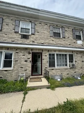 Buy this 2 bed townhouse on 7721 South Coles Avenue in Chicago, IL 60649