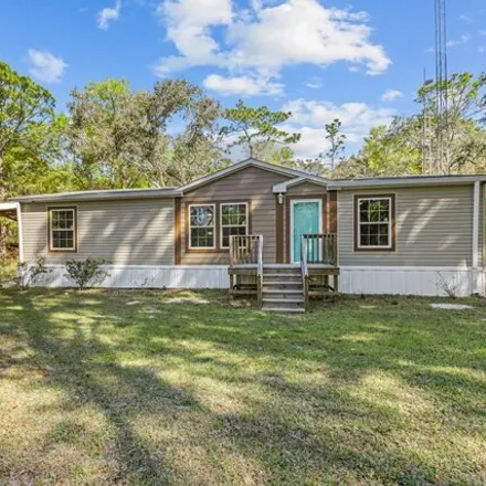 Buy this studio apartment on 134 Place in Levy County, FL 32644