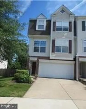 Rent this 3 bed townhouse on 8214 Glade Bank Drive in Yorkshire, Prince William County