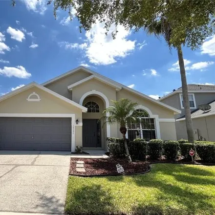 Rent this 4 bed house on 14106 Serena Lake Drive in Hunters Creek, Orange County