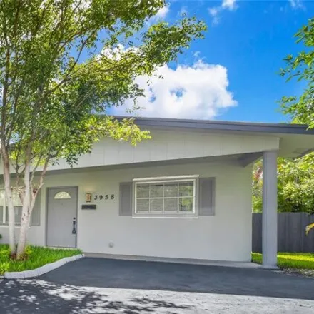 Buy this 4 bed house on 3958 Northwest 19th Avenue in Royal Palm Isles, Broward County