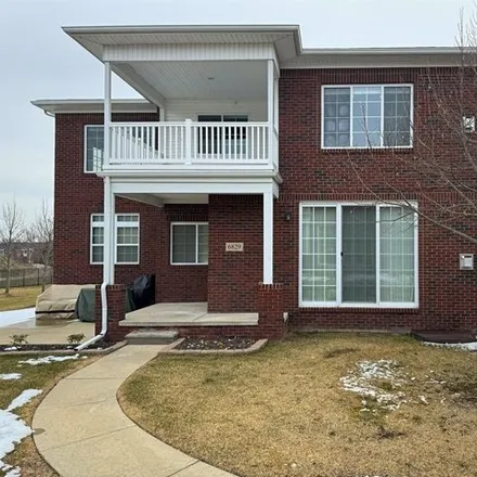 Buy this 2 bed condo on 6849 Boulder Pointe Drive in Washington Charter Township, MI 48094