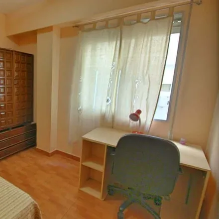 Rent this 4 bed room on distrito 21 in Carrer de Polo i Peyrolón, 21