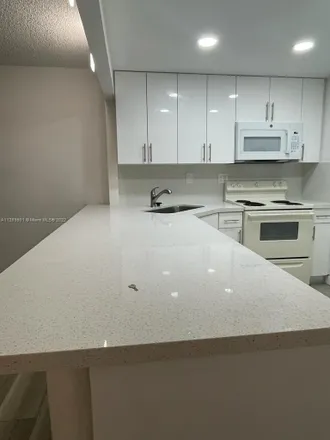 Rent this 2 bed condo on 4599 Northwest 9th Street in Miami, FL 33126