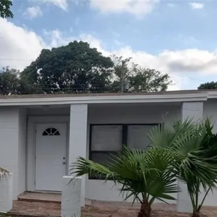 Rent this 4 bed house on 3402 Northwest 7th Street in Browardale, Lauderhill