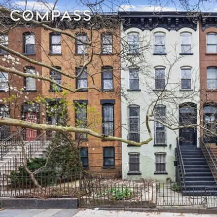 Buy this 5 bed townhouse on 16 Park Place in New York, NY 11217