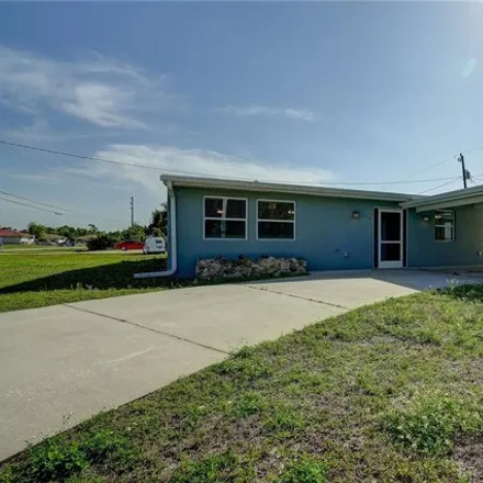 Buy this 3 bed house on 929 Victoria Avenue Northwest in Port Charlotte, FL 33948