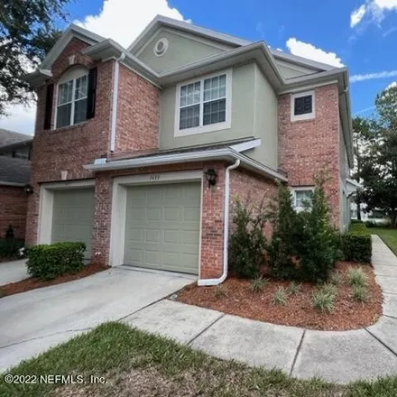 Rent this 3 bed townhouse on 7499 Scarlet Ibis Lane in Jacksonville, FL 32256