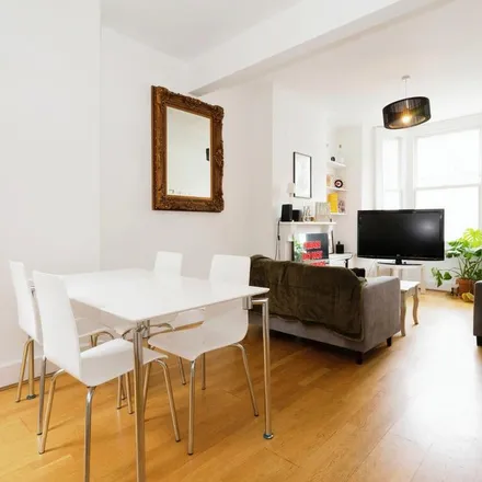 Rent this 4 bed townhouse on Kerrison Road in London, SW11 2QE