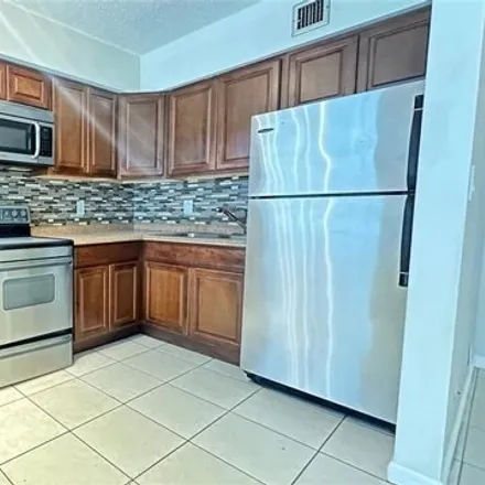 Rent this 2 bed condo on Windsor Court in Fort Lauderdale, FL 33304