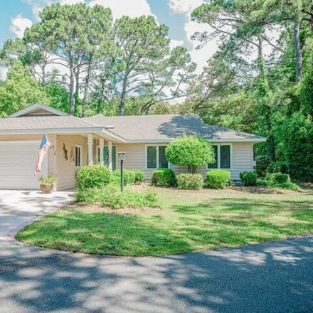 Buy this 3 bed house on 729 Fairway Dr E in Sunset Beach, North Carolina