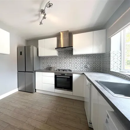 Rent this 3 bed townhouse on Valley Crescent in Wokingham, RG41 1NP