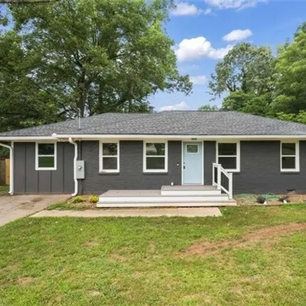 Buy this 4 bed house on 2119 Whites Mill Road in Candler-McAfee, GA 30032