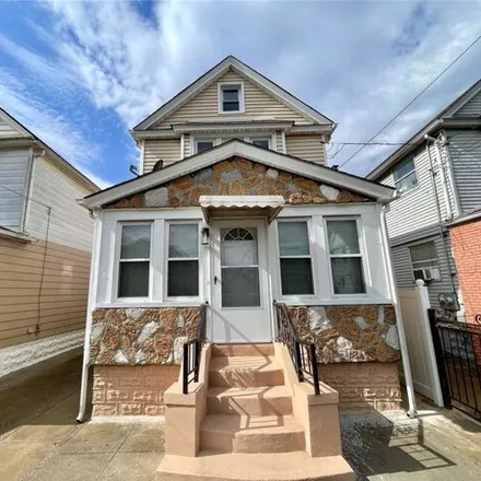 Buy this 3 bed house on 133-10 132nd Street in New York, NY 11420