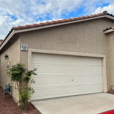 Rent this 2 bed townhouse on 9701 Tullyroe Avenue in Las Vegas, NV 89129