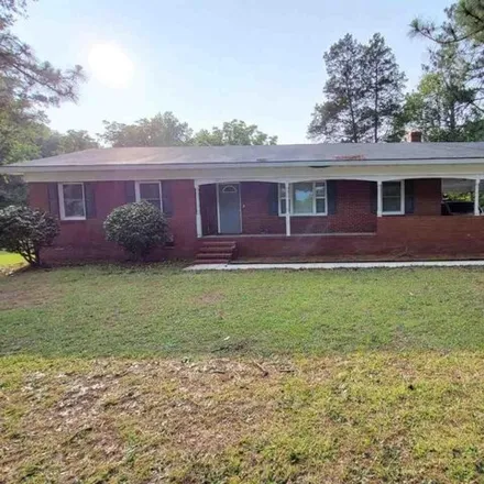 Buy this 3 bed house on 1883 Commerce Drive in Dillon, SC 29536