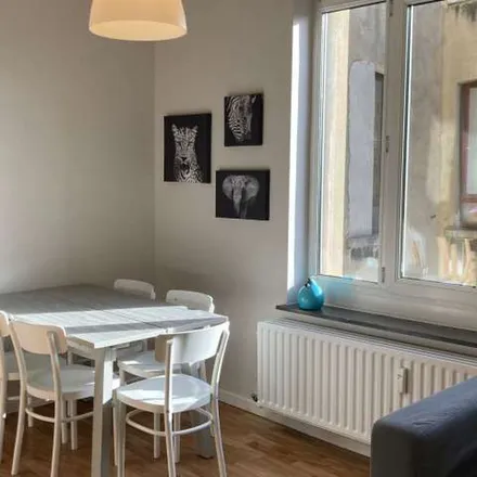 Rent this 2 bed apartment on Ebrius artis in Place Rouppe - Rouppeplein 7, 1000 Brussels