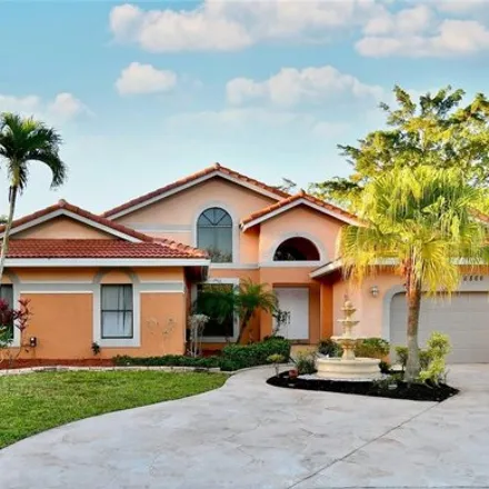 Buy this 5 bed house on 8866 Northwest 47th Drive in Ridgeview, Coral Springs