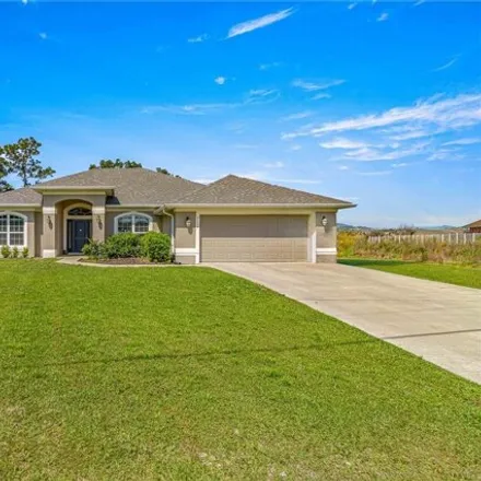 Buy this 4 bed house on 7184 Southwest 130th Lane Road in Marion County, FL 34473