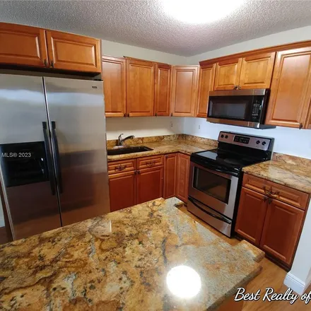 Rent this 3 bed apartment on 13891 Southwest 62nd Terrace in Miami-Dade County, FL 33183