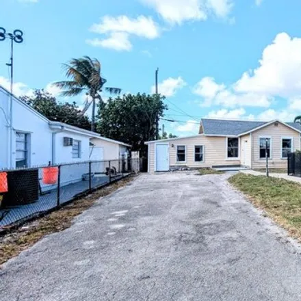 Buy this 2 bed house on 1031 McIntosh Street in West Palm Beach, FL 33405