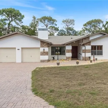 Buy this 4 bed house on 9127 Sandpine Court East in Citrus County, FL 34446