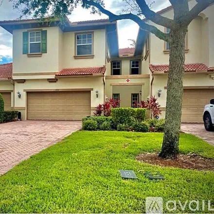 Image 1 - 6054 NW 116th Dr, Unit 6054 - Townhouse for rent