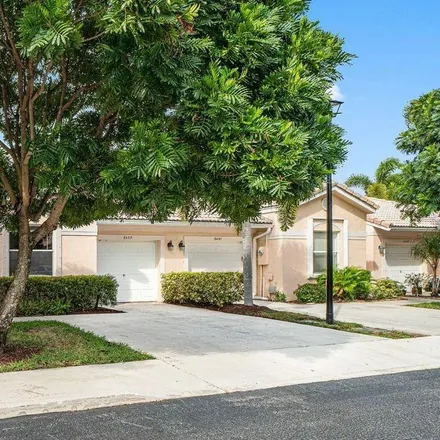 Rent this 2 bed townhouse on 2411 Coral Trace Circle South in Kingsland, Delray Beach