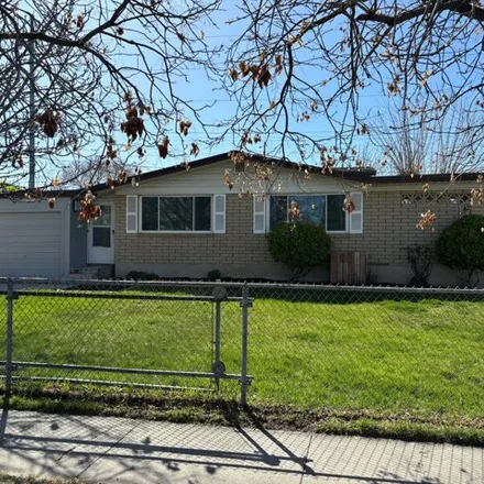 Buy this 4 bed house on 3242 Meadowlark Drive in West Valley City, UT 84119