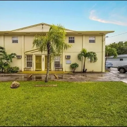 Rent this 2 bed house on 6900 Northwest 15th Avenue in Liberty Square, Miami