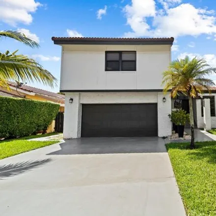 Rent this 4 bed house on 6516 Sweet Maple Lane in Boca Raton, FL 33433