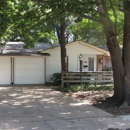 Rent this 3 bed house on 378 Hanover Lane in Irving, TX 75062