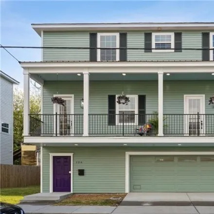 Buy this 4 bed condo on 123 South Salcedo Street in New Orleans, LA 70119