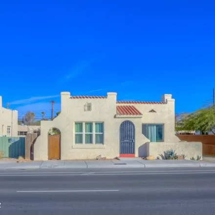 Buy this 3 bed house on 1333 E Broadway Blvd in Tucson, Arizona