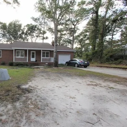 Rent this 3 bed house on 256 Dolphin Street in Cape Carteret, NC 28584