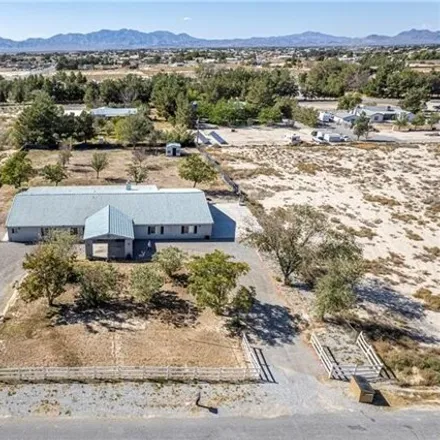 Buy this 4 bed house on 3982 Oakridge Avenue in Pahrump, NV 89048