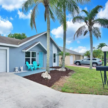 Rent this 3 bed house on Medx Hearing Center in Sunset Pines Drive, Delray Beach