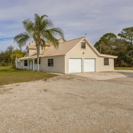 Buy this 6 bed house on 3247 Fox Lake Road in Titusville, FL 32780