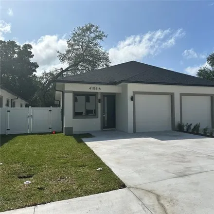 Rent this 3 bed house on 4170 North Thatcher Avenue in Drew Park, Tampa