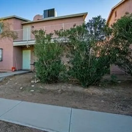 Rent this 4 bed house on 1141 East Winnie Place in Tucson, AZ 85719