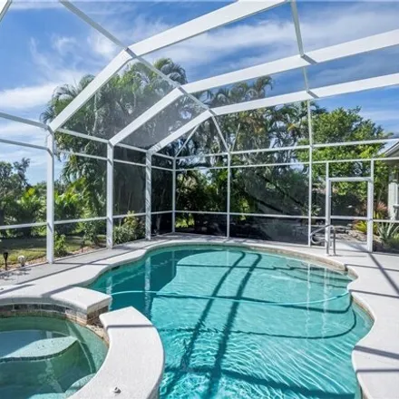 Buy this 4 bed house on 8775 Banyon Cove Circle in Lee County, FL 33919