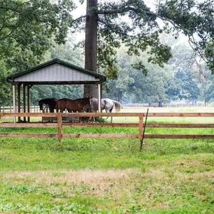 Rent this 4 bed house on Oak Creek Equestrian Center in 1220 Villa Rica Road Southwest, Marietta